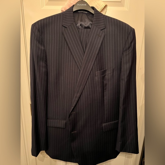Blue pinstripe Lauren by Ralph Lauren suit 52L jacket 44/30 pant.